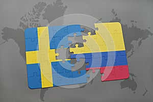 puzzle with the national flag of sweden and colombia on a world map background.