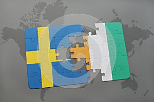 puzzle with the national flag of sweden and cote divoire on a world map background.
