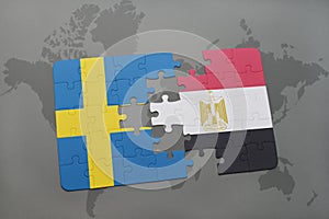 puzzle with the national flag of sweden and egypt on a world map background.