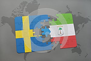 puzzle with the national flag of sweden and equatorial guinea on a world map background.