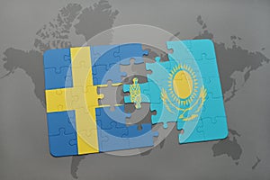 puzzle with the national flag of sweden and kazakhstan on a world map background.