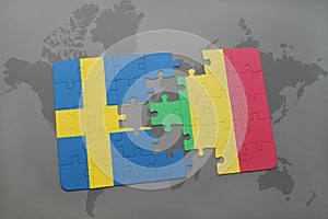 puzzle with the national flag of sweden and mali on a world map background.