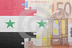 Puzzle with the national flag of syria and euro banknote