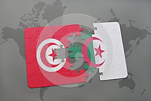 puzzle with the national flag of tunisia and algeria on a world map