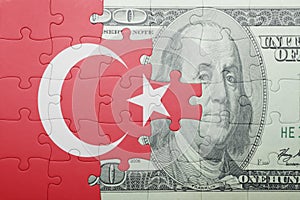 Puzzle with the national flag of turkey and dollar banknote