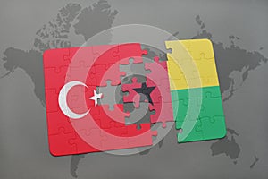 puzzle with the national flag of turkey and guinea bissau on a world map