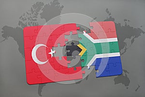 puzzle with the national flag of turkey and south africa on a world map