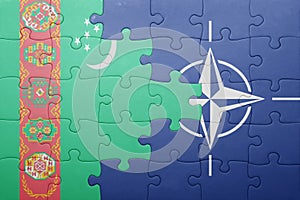 Puzzle with the national flag of turkmenistan and nato
