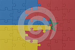 puzzle with the national flag of ukraine and morocco . macro.concept