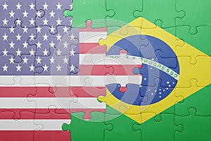 Puzzle with the national flag of united states of america and brazil