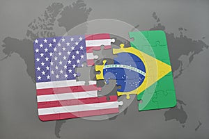 Puzzle with the national flag of united states of america and brazil on a world map background