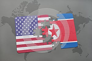 puzzle with the national flag of united states of america and north korea on a world map background