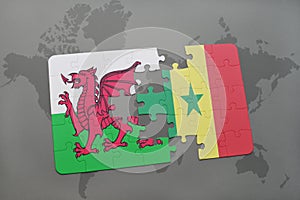 puzzle with the national flag of wales and senegal on a world map