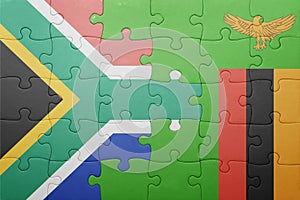 puzzle with the national flag of zambia and south africa
