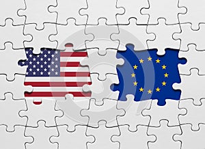 Puzzle with the national flags of United States of America and EU