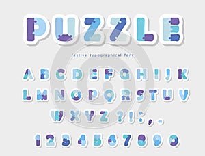 Puzzle paper cut out font in blue colors. Vector