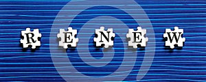 Puzzle piece with RENEW text on a blue background