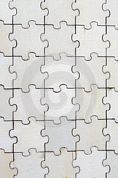 Puzzle pieces grid, jigsaw puzzle beige wood, success mosaic solution template, horizontal. Blank assembled puzzles with