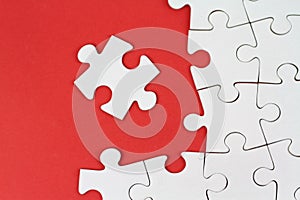 Puzzle pieces on red background