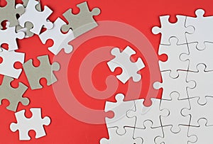 Puzzle pieces on red background