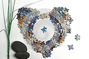 Puzzle pieces shaped in the form of a heart zen feeling mind relaxation