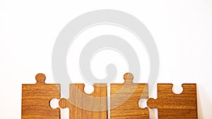 Puzzle pieces on white table background. solutions, mission, successful, goals, cooperation, partnership and strategy concept