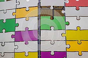 Puzzle wall with missing piece 2