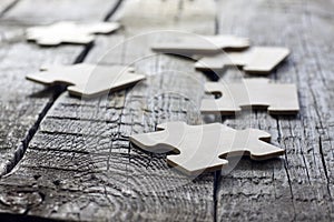 Puzzle on wooden boards team business concept