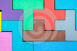 Puzzle from wooden pentominoes and blocks