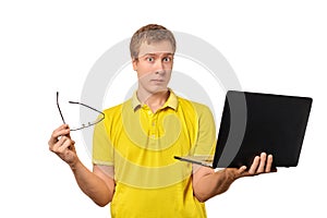 Puzzled male with notebook and glasses in hands isolated on white background, funny puzzled look