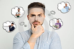 Puzzled man thinking about probable profession on bakground photo