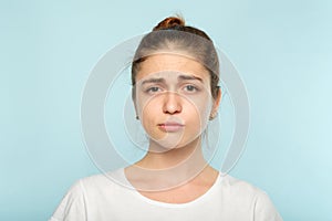 Puzzled skeptic doubtful woman facial expression