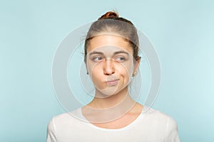 Puzzled skeptic doubtful woman facial expression