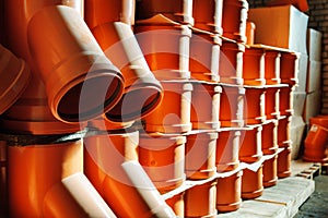 PVC fitting in the warehouse - a draining tee revision pipe