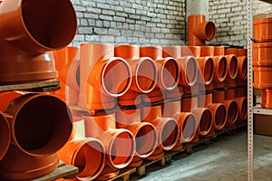 PVC fitting in the warehouse - a draining tee revision pipe