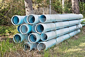 PVC pipes bundle for underground water mains construction. photo