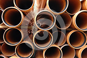 PVC pipes stacked in construction site