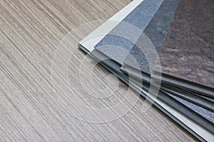 PVC Polymer Vinyl sample for customers to choose the floor design within the copy space.