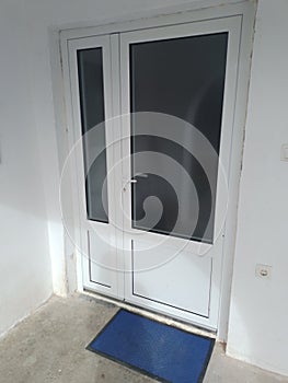 PVC white entrace door, front door photo