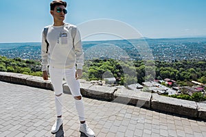 Pyatigorsk  Stavropol Territory  country Russia 01 05 2018 A Handsome guy posing in Pyatigorsk near the sights of the Eolian Harp