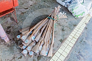 PYIN OO LWIN, MYANMAR - NOVEMBER 30, 2016: Rifle shaped walking sticks at the train station in Pyin Oo Lwin, Myanm