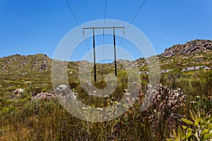 A pylon carrying high voltage cables for Eskom near a lodge in South Africa