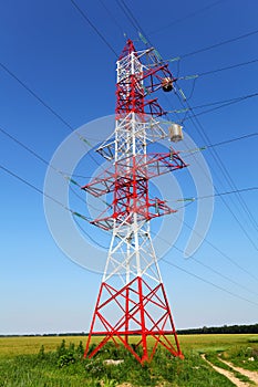 Pylon of power line in the field