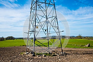 Pylon power transmission line support in countryside