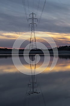 Pylon reflection on the Loughor estuary
