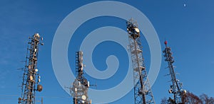 Pylons with telecommunication repeaters