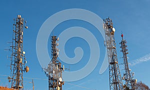 Pylons with telecommunication repeaters