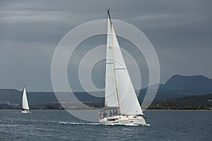 PYLOS, GREECE - Sailboats participate in sailing regatta among Greek island group