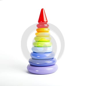 Pyramid build from colorful plastic rings, isolated on white.