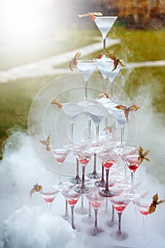Pyramid of Champagne Glasses with Dry Ice Vapor